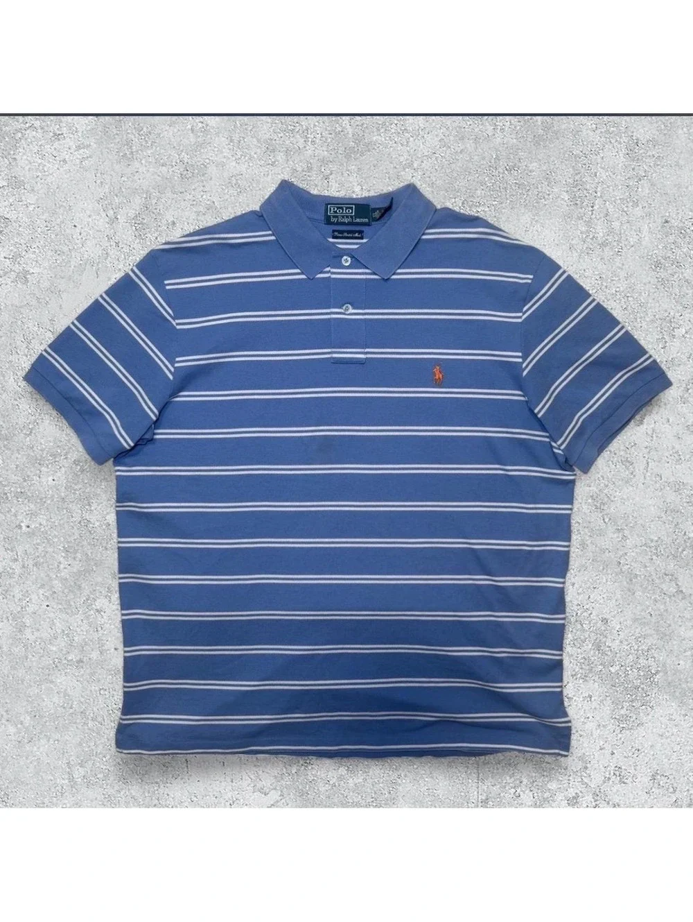 Polo Ralph Lauren blue and white stripped polo shirt